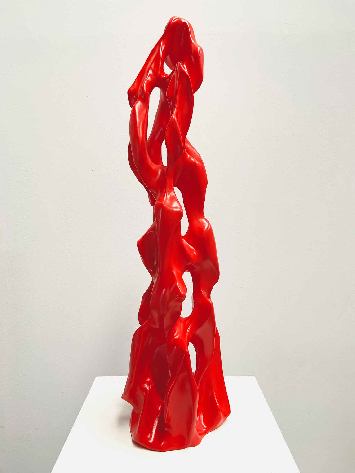 Red sculpture of organic shapes