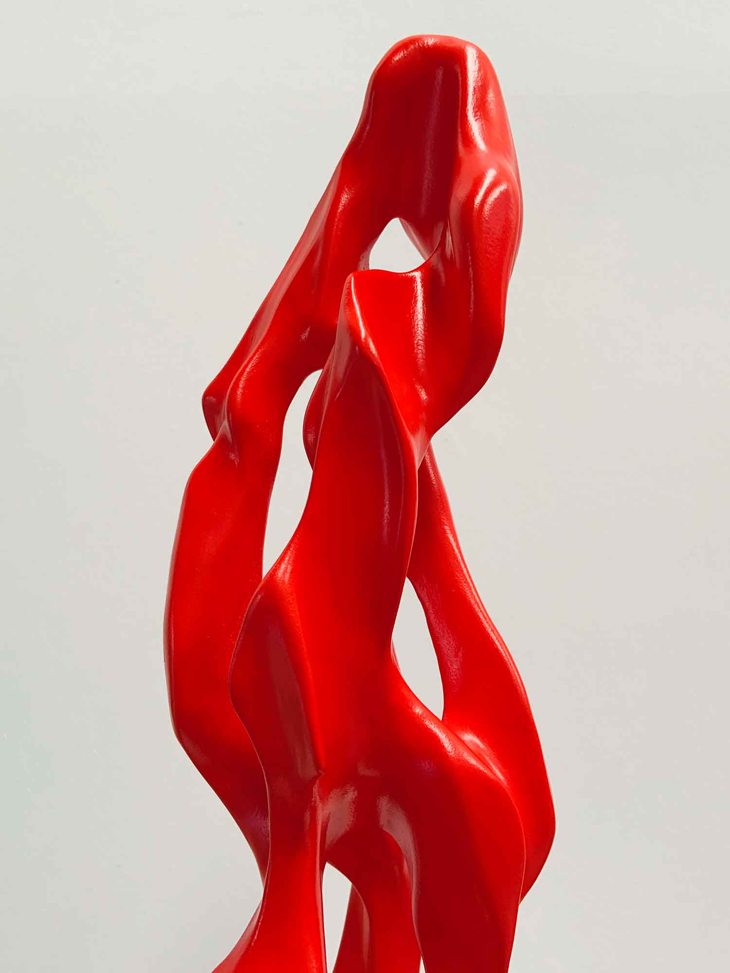 Red sculpture of organic shapes